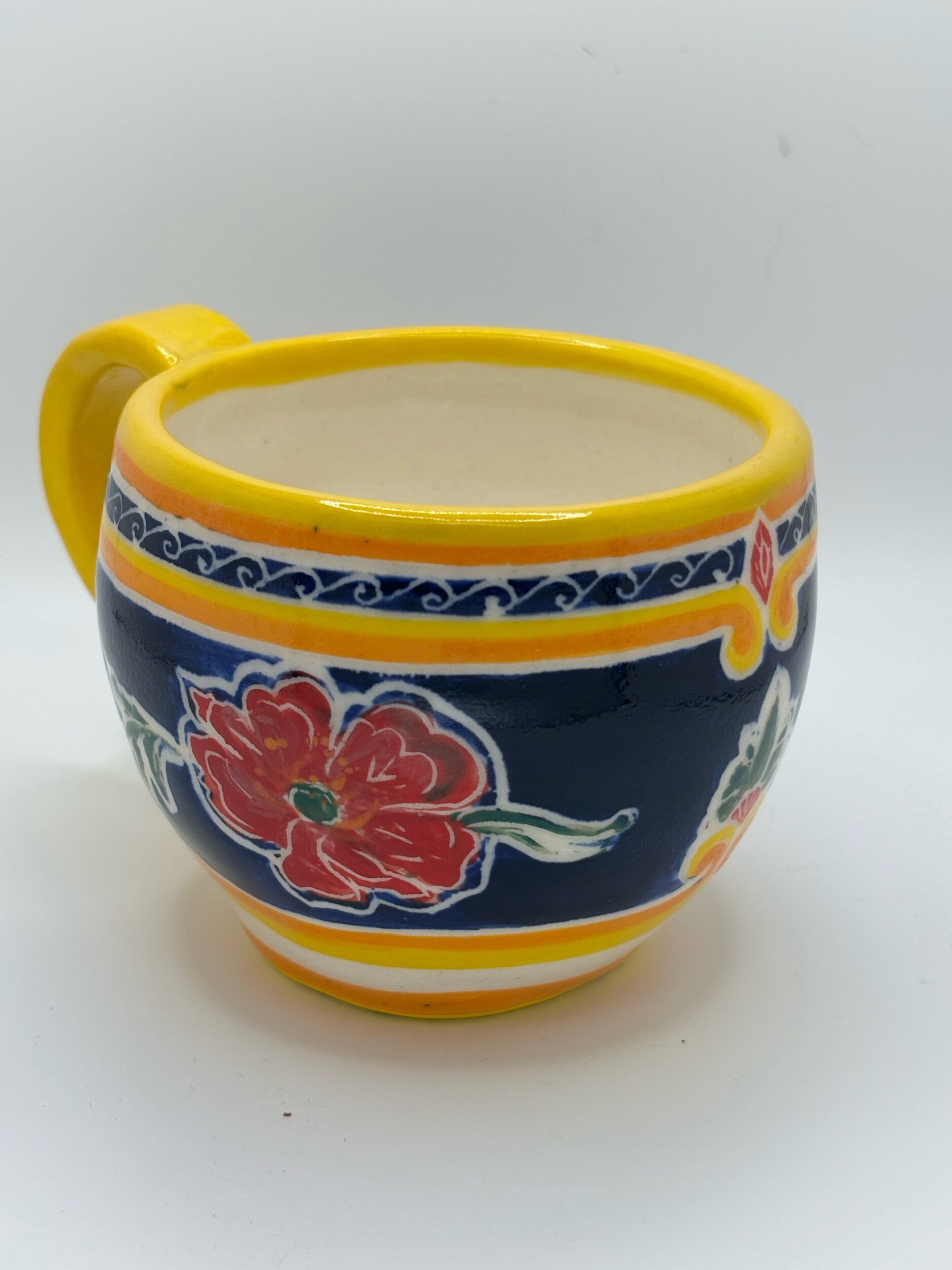 Flowers on blue cup