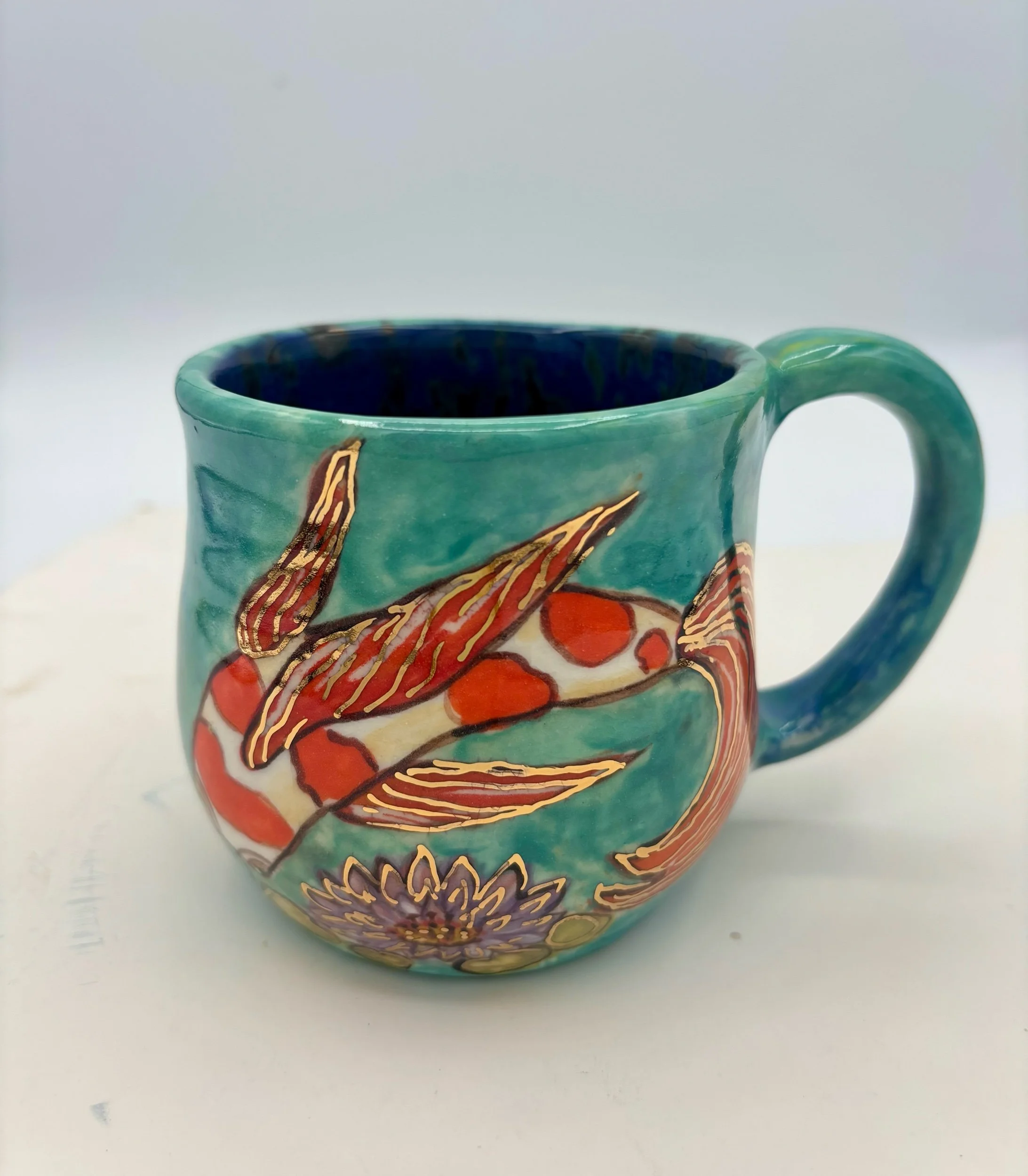 Gold koi fish cup 1
